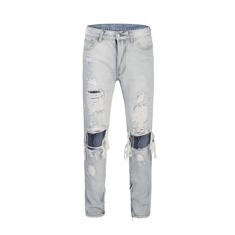 Licht denim gescheurd