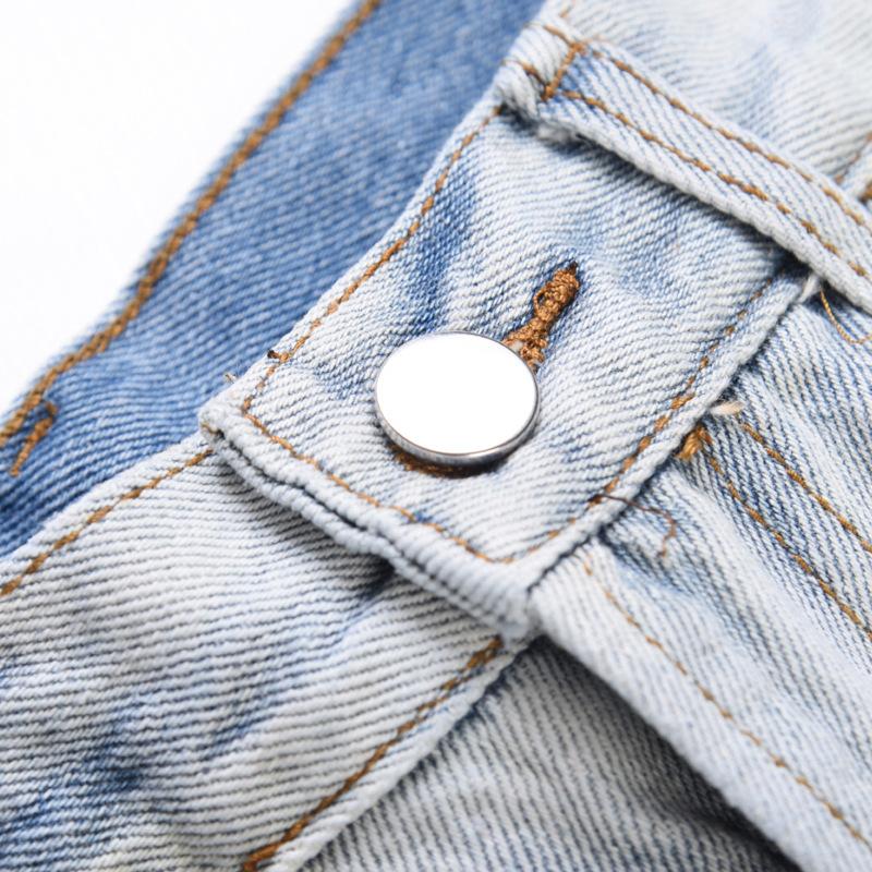 Licht denim gescheurd