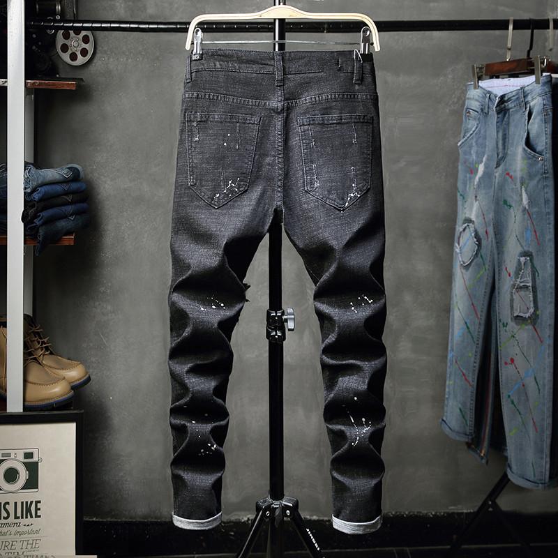 Black Jeans With Colorful Patch