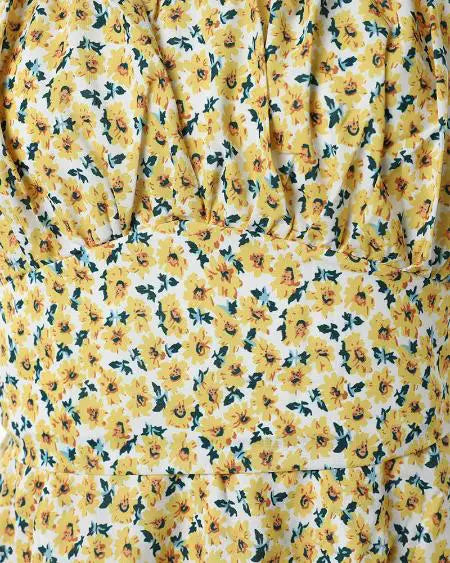 Off-shoulder jurk met vrolijke bloemenprint en ruches aan de zoom 
