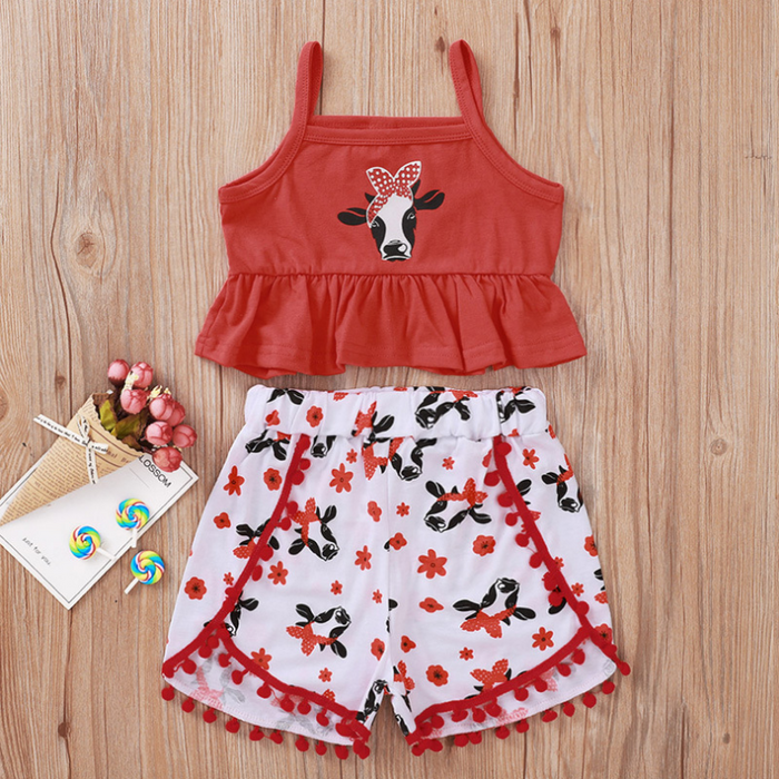 Baby/peuter set met top en broek met koeienprint