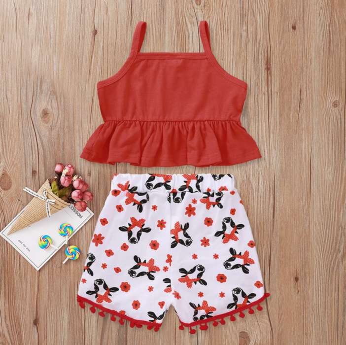 Baby/peuter set met top en broek met koeienprint