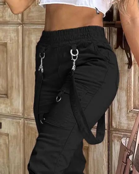 Pantalones con tirantes, diseño de bolsillo y detalle de puños 