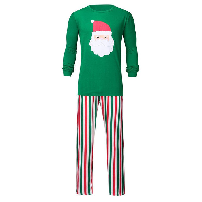 Conjunto de pijama a juego familiar con pantalones a rayas y top con estampado de Papá Noel navideño