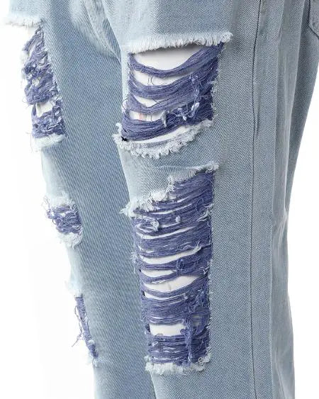 Jeans con recortes rasgados en bloques de colores 