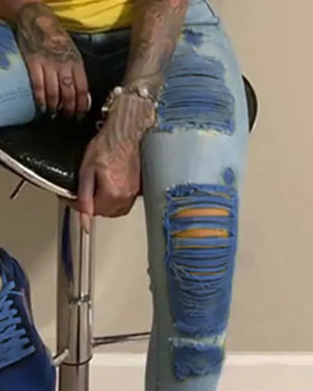 Jeans met gescheurde uitsnijdingen in colorblock 