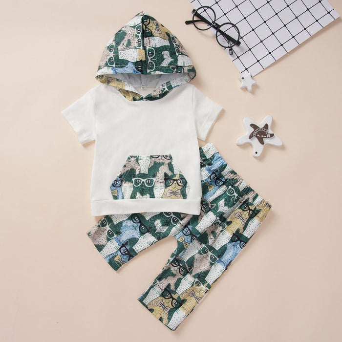 Set met schattige babytop en broek met capuchon en kattenprint