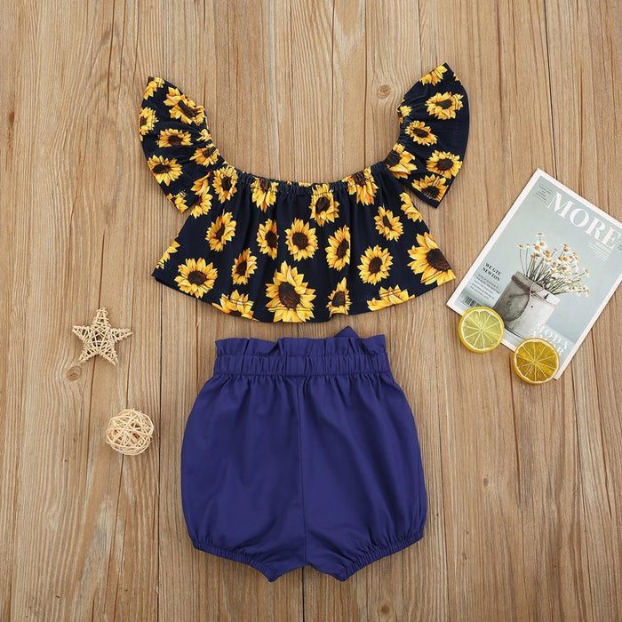 Conjunto para bebé niña de camiseta sin mangas con estampado de girasoles y shorts lisos