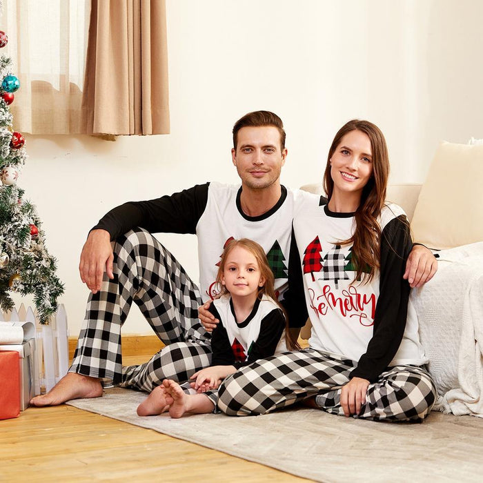 Familie-look zwart/wit/rood feestpyjamasets Geruite positioneringsprint Bijpassende pyjama