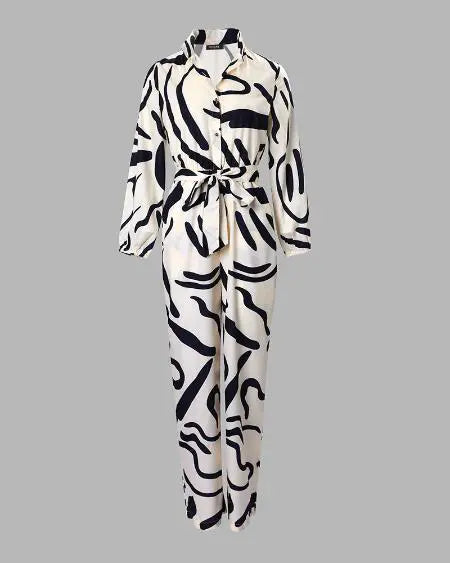 Jumpsuit met riem, abstracte print en lange mouwen 