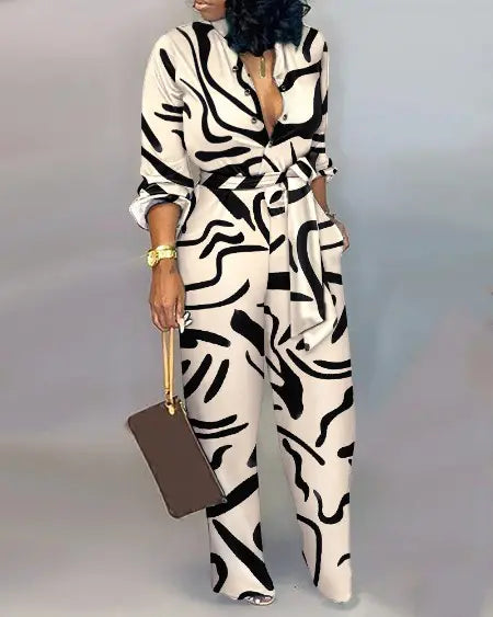 Belted Jumpsuit with Abstract Print & Long Sleeves