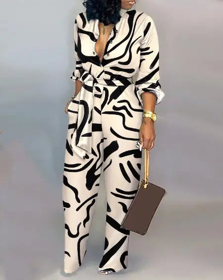 Belted Jumpsuit with Abstract Print & Long Sleeves