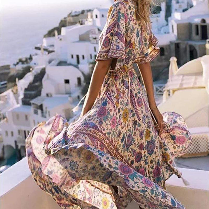Lange maxi-jurk met bloemenstrand 