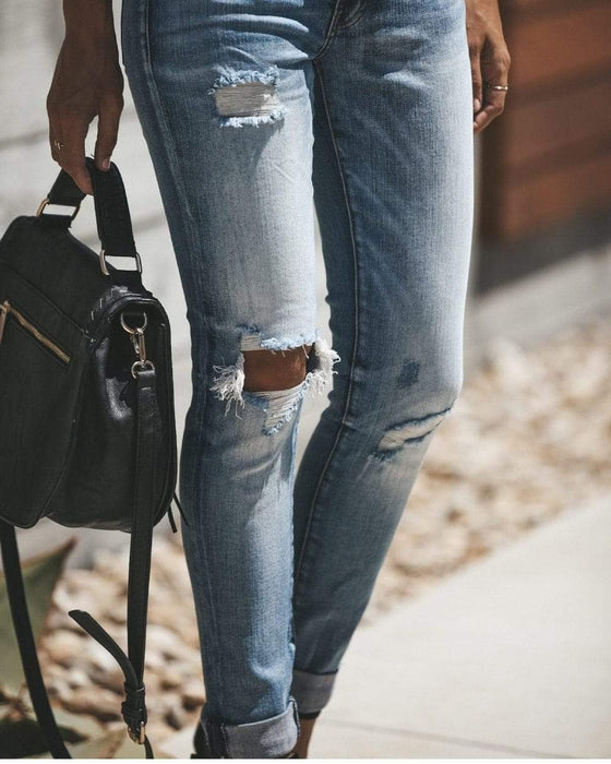 Gebleekte gescheurde denim skinny jeans 