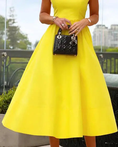 Sleeveless Dress with Round Neck and Flare Design