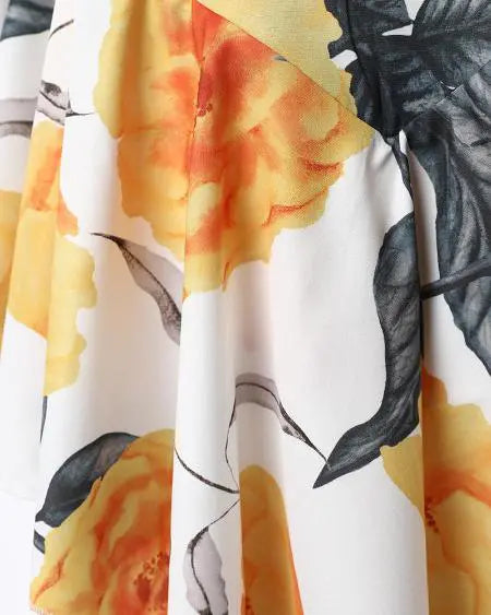 Plunge Romper with Tropical Print & Ruffle Hem