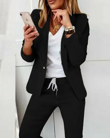 Combinatie blazer met revershals en broek met trekkoord 