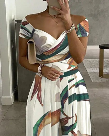 Off-shoulder jumpsuit met plantenprint 