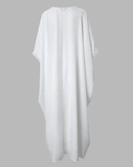 Top largo con abertura alta y pantalones con encaje en contraste 