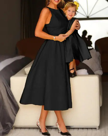 Sleeveless Dress with Round Neck and Flare Design